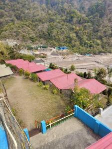 an overhead view of a building with red roofs at Shivpuri Hills Camp in Jāmb