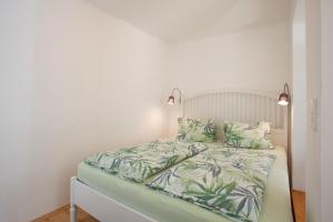 Llit o llits en una habitació de Ferienwohnungen Steger