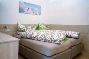 A bed or beds in a room at Apart Mirjam