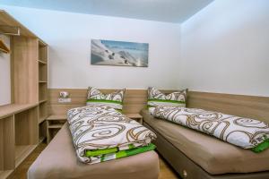 A bed or beds in a room at Apart Mirjam