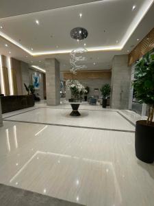 a large lobby with a large white dance floor at Casa MJ Suites at SMDC Fame Residences, Mandaluyong in Manila