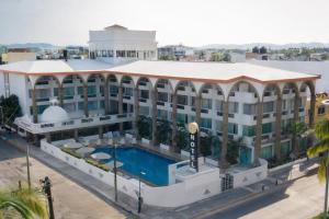 an aerial view of a hotel with a swimming pool at Solamar Inn Mazatlan in Mazatlán