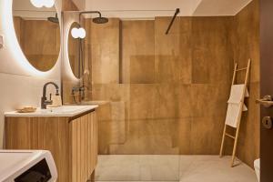 a bathroom with a shower and a sink at TR 1823 Vendégház in Mád +48 photos