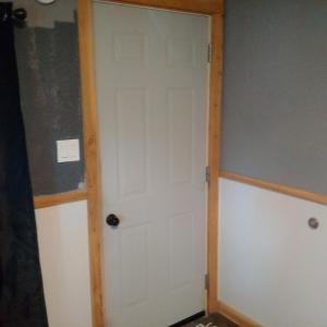 a door in the corner of a room at Jasper Way Inn Resort & Campground in Clearwater +144 photos