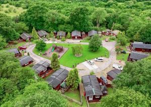 an aerial view of a small village with a park at Heronstone Lodges in Ystalyfera