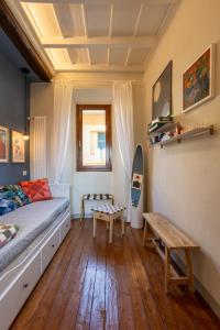 a bedroom with a bed and a table in it at Luna Nova in Meina