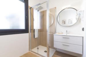 a bathroom with a sink and a mirror at Ne Ta B&B Ravenna in Ravenna +15 photos