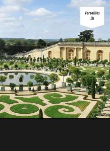 an image of a garden with a building at Escale 53 A 5 min aéroport Orly in Athis-Mons