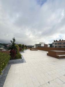 a large patio with benches on top of a building at Sparkle2600 at Megatower 1 in Baguio