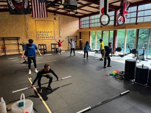 a group of people exercising in a gym with poles at Tiny House - Vacation STAY 12059v in Ōtakuchi