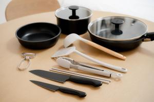 a bunch of kitchen utensils sitting on a table at GuestHouse MIYABI in Kyoto