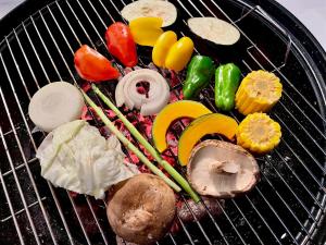 a grill with vegetables and meat on it at 天海の城 in Saikai +8 photos