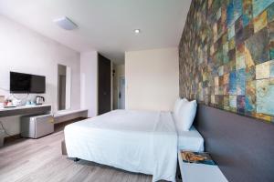 TV a/nebo společenská místnost v ubytování Prajaktra City Hostel