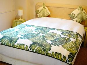 Krevet ili kreveti u jedinici u okviru objekta Breezbay Seaside Resort Matsushima