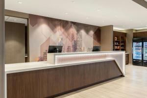 a lobby of a hotel with a reception desk at SpringHill Suites by Marriott Columbus West in Columbus +32 photos