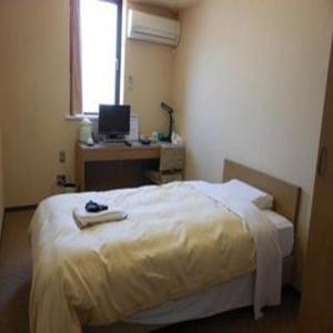君津山酒店 客房内的一张或多张床位