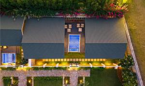 an overhead view of a building with a blue roof at Merriment Luxury Resort & Private Pool Villa Near Mount Abu, Abu Road in Bhīmānia +58 photos
