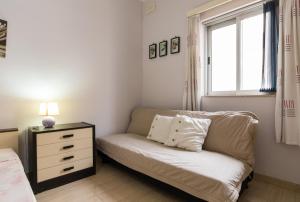 Ein Bett oder Betten in einem Zimmer der Unterkunft SeaFront Apartment Marsascala