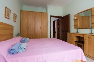 Ein Bett oder Betten in einem Zimmer der Unterkunft SeaFront Apartment Marsascala