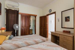 Ein Bett oder Betten in einem Zimmer der Unterkunft SeaFront Apartment Marsascala