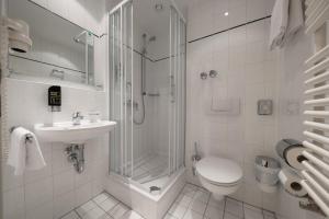 Ванна кімната в Hotel Royal