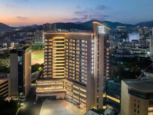 a view of the mgm hotel at night at NOVOTEL Zhoushan Luting in Zhoushan