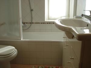 Kylpyhuone majoituspaikassa Lidia Apartment