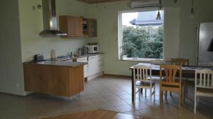 Kuchyň nebo kuchyňský kout v ubytování Kaare Guesthouse