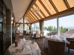 Posezení v ubytování Design-Konferenzhotel & Restaurant Steinernes Schweinchen