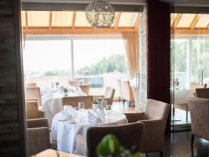 Posezení v ubytování Design-Konferenzhotel & Restaurant Steinernes Schweinchen