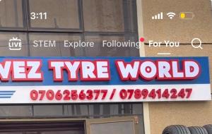a sign on the side of a building at Spark Africa Hotel in Jinja