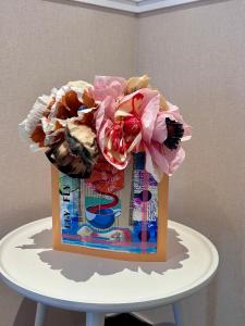 a bag on top of a white table at Delle rose inn in Piano di Sorrento +39 photos