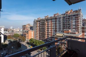 a view of a city from a balcony at Easy Downtown Inn in Marghera