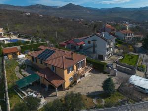 an aerial view of a house with solar panels on its roof at Emma in Krasica