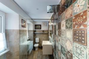 a bathroom with a toilet and a sink at Bellagio Bed & Breakfast in Bellagio +120 photos