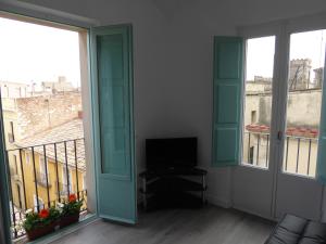 A balcony or terrace at Apoteka apartaments