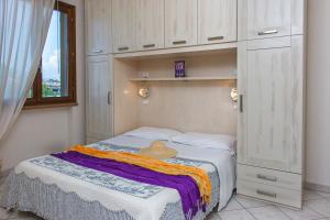 Katil atau katil-katil dalam bilik di Villetta Tina