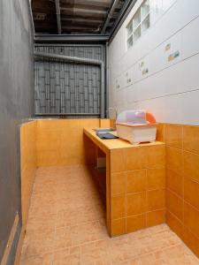 a room with a desk and a sink in it at Cool cozy In Yaowarat in Bangkok +58 photos