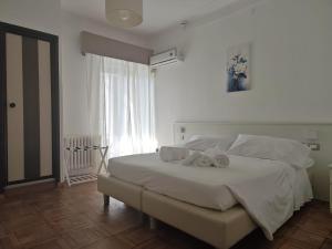 Llit o llits en una habitació de Hotel Rio Sanremo