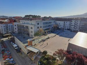 an overhead view of a city with a parking lot at Torre Plaza 4 in Boiro