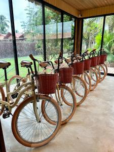a row of bikes parked next to each other at Pousada Rancho Luar in Pôrto de Pedras