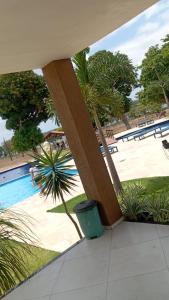 a view of a pool from a building with a trash can at Day Use in Cascavel