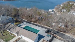 an aerial view of a house with a swimming pool at Margarita Manor on Staniel Cay in Osage Beach
