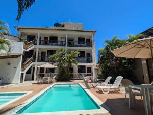 a view of the hotel from the swimming pool at Pousada Stella Tropical in Salvador