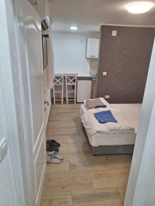 a small room with two beds and a hallway at Dream 3 in Vračar (historical) +5 photos