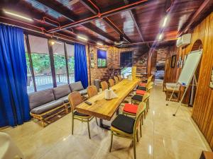 a conference room with a long table and chairs at Templer Park Rainforest Retreat TPRR in Rawang