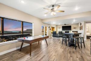 a living room with a ping pong table at On the Rocks Lodge in Branson