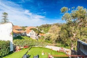 an aerial view of a house with a yard at Villas de Cintra in Sintra