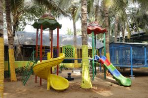 a playground with several slides and slidesktop at Sri Kalki Jamjam Resort in Erode