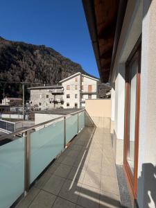 a balcony with a view of a mountain at Ca' de Mario in Sondalo